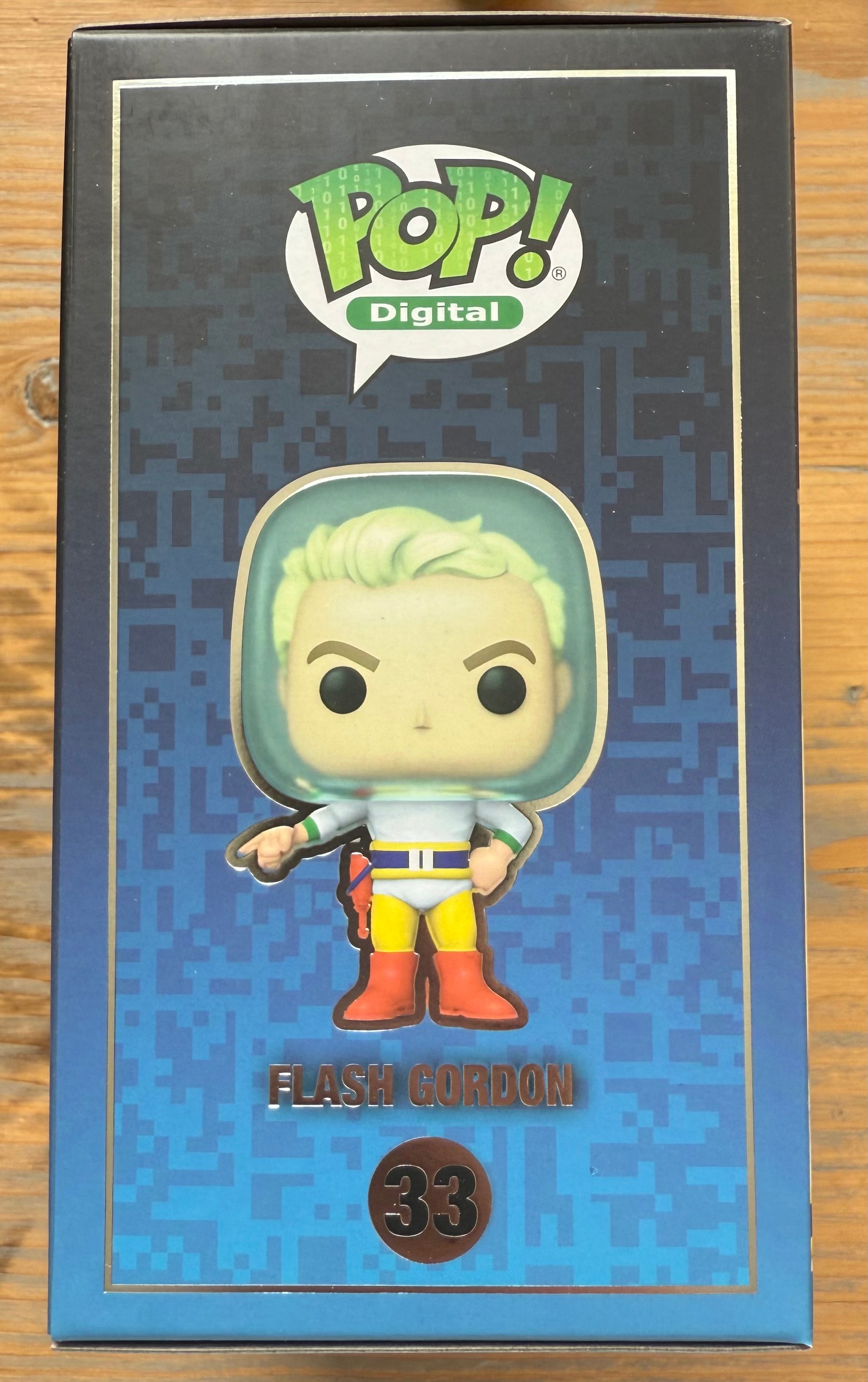 Funko Pop Digital vinyl figure box, light green hair character with yellow shirt and red pants