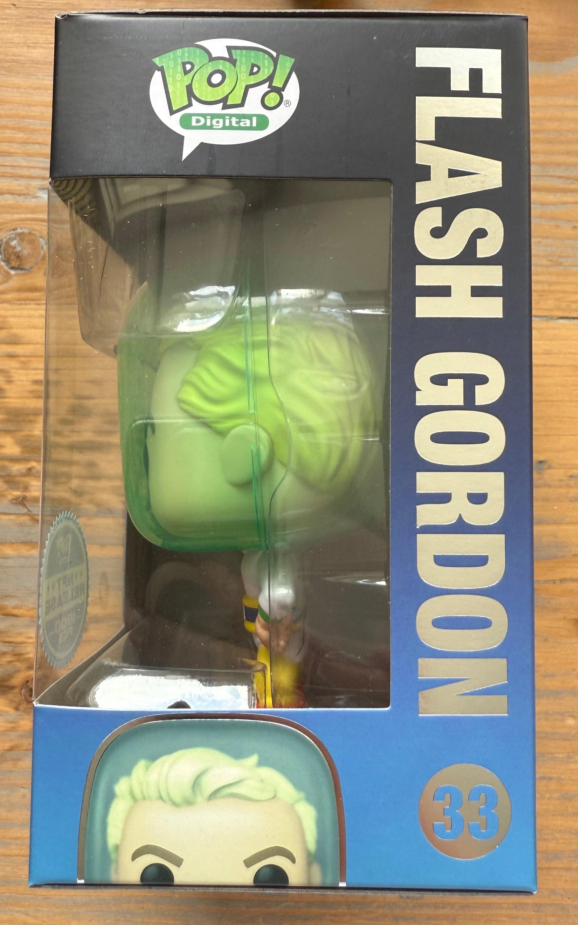 Funko Pop Digital vinyl figure in box window, light green hair and face, yellow and red outfit