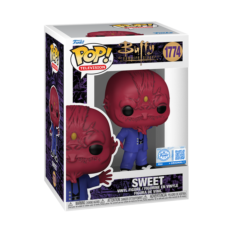 Vinyl collectible figure with red demon face and blue suit, arms out, special edition box