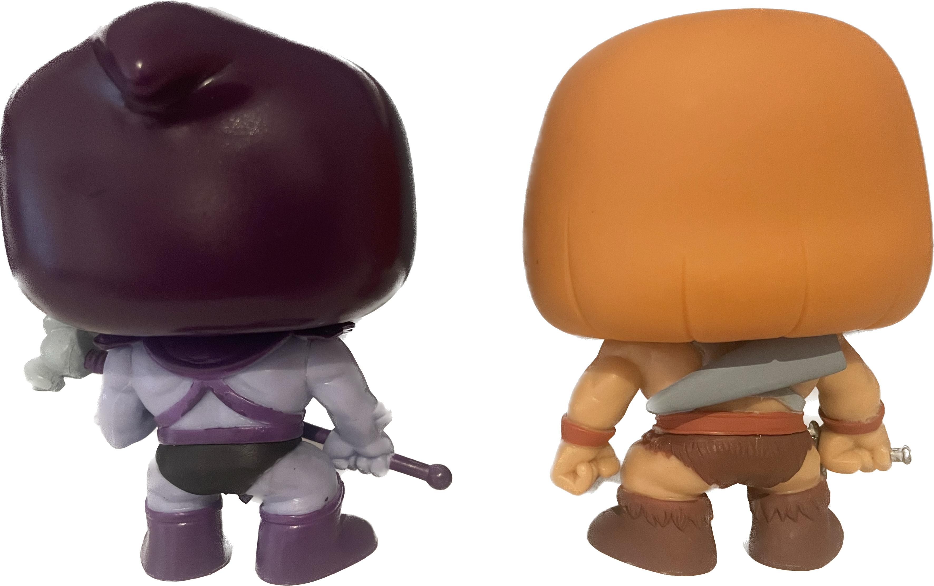 Funko Pop! He-Man and Skeletor vinyl figures, rear views, out of box