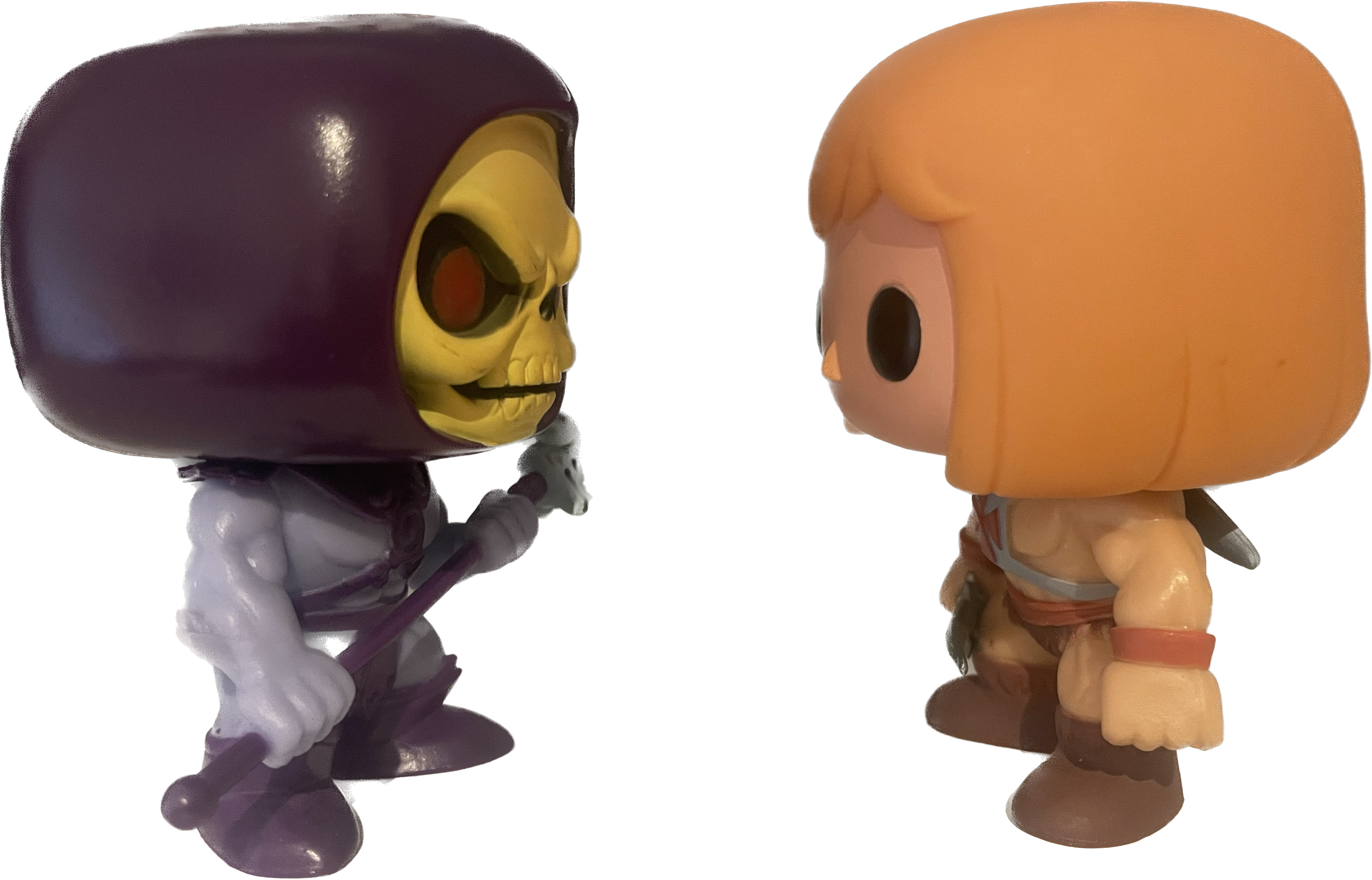 Funko Pop! He-Man and Skeletor vinyl figures, three-quarter angle, out of box