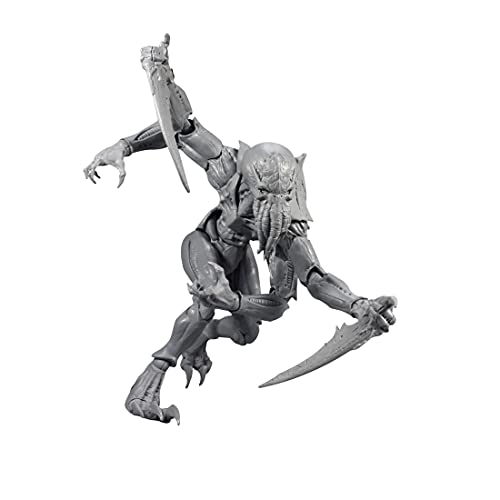 Grey Tyranid Genestealer action figure crouching with extended arm and blade