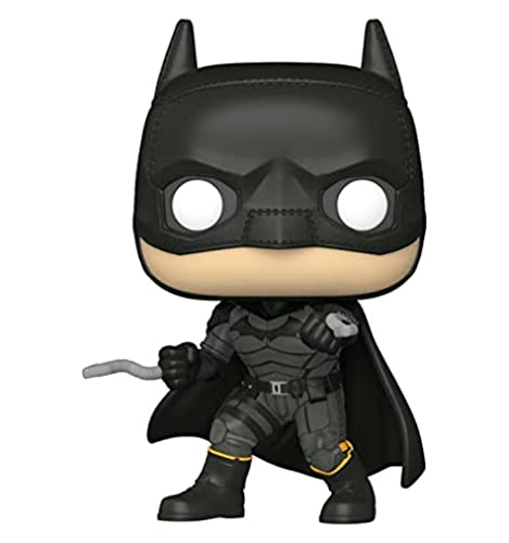 Vinyl Batman figure with black cowl and textured suit, cape, holding a cane
