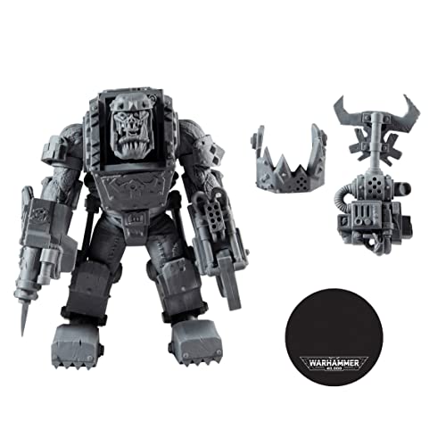 Warhammer Ork Meganob action figure with big armor and shoulder weapons, loose parts shown