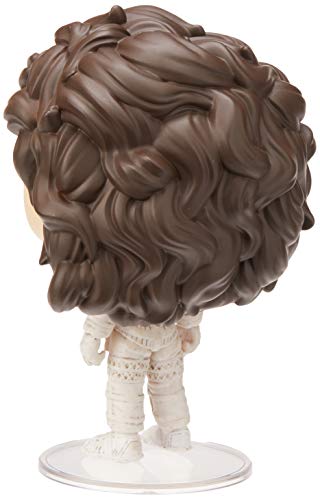 Vinyl figure in a white space suit with brown hair, shown from behind on base.