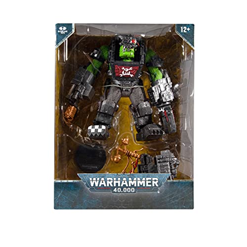 Ork Big Mek action figure in retail box, black armor with green face and red emblem