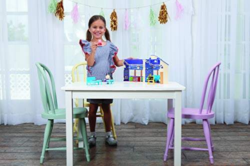 Child playing with Peppa Pig playhouse set with toy house and furniture