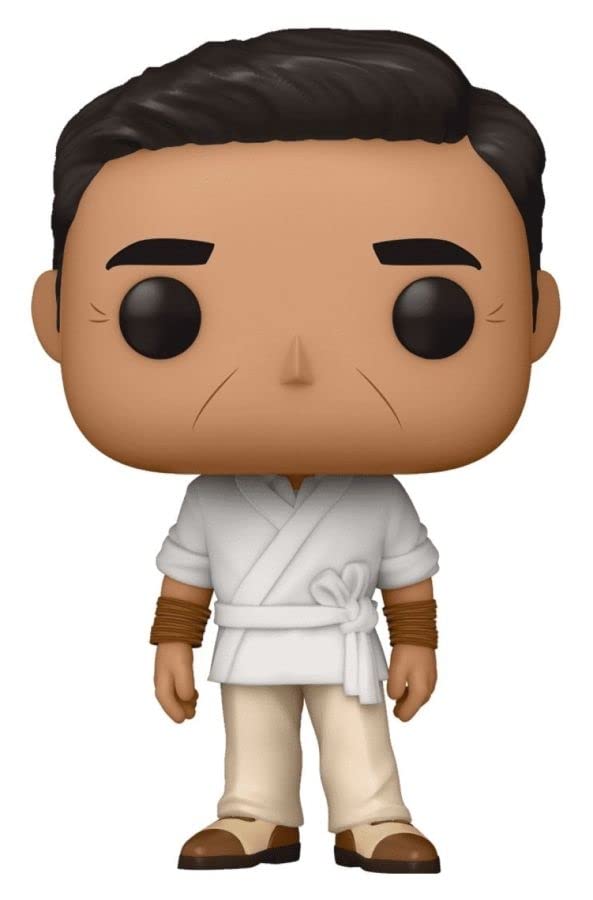 Collectible character figure in white robe with tied belt, tan pants, brown shoes