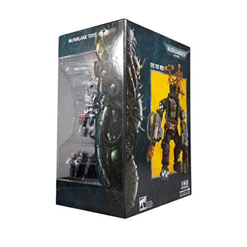 Ork Big Mek action figure box packaging with window showing black and green figure