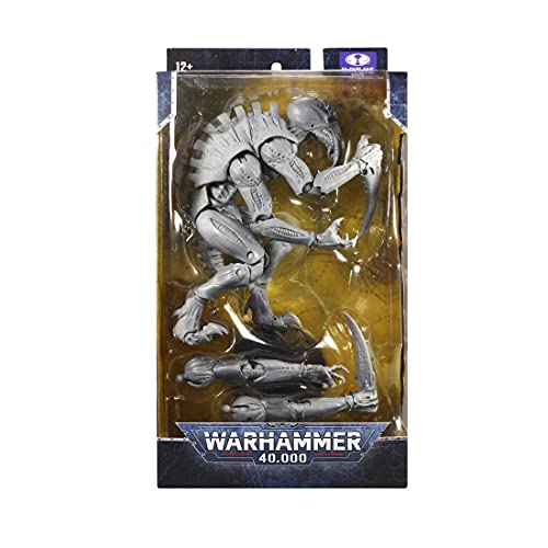 Warhammer 40,000 boxed Tyranid Genestealer action figure with clear window and 12+ label