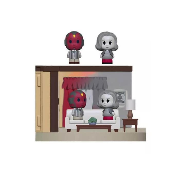 Collectible vinyl figure set of two characters seated in a miniature living room