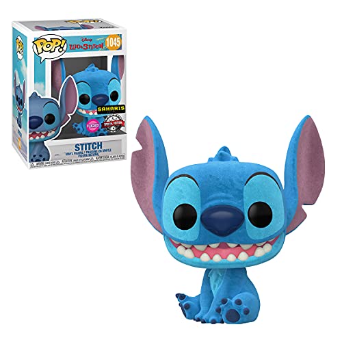 Sitting blue Stitch vinyl figurine with large ears, shown beside boxed set