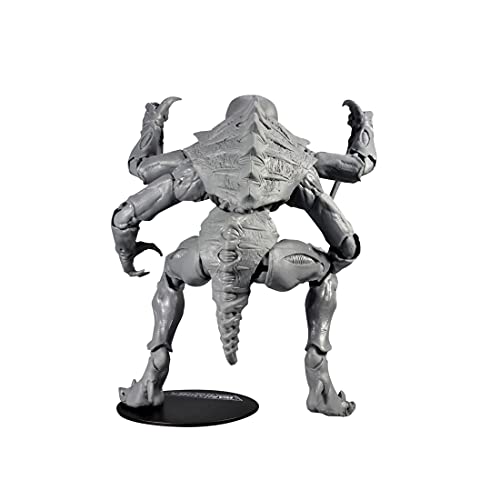 Grey Tyranid Genestealer action figure standing with arms raised on round black base