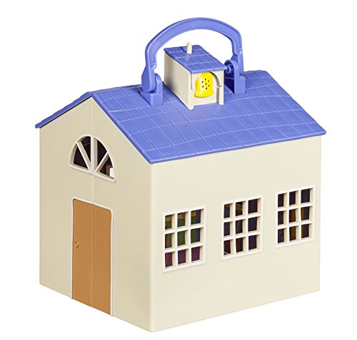 Peppa Pig playhouse with blue roof and yellow top detail
