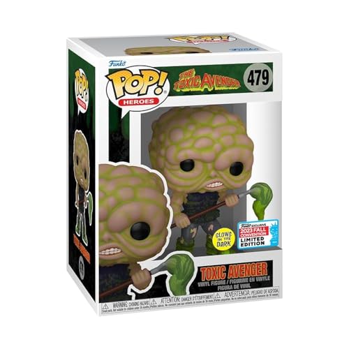 Glow-in-the-dark vinyl Pop figure in box, green masked hero holding weapon