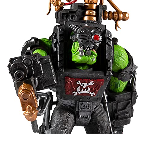 Ork Big Mek action figure close-up: green face, skull mask, black armor chest panel