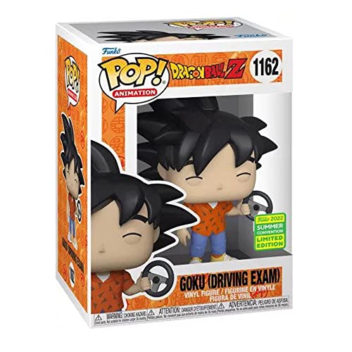 Vinyl Goku collectible figure in box, orange top, blue pants, holding steering wheel