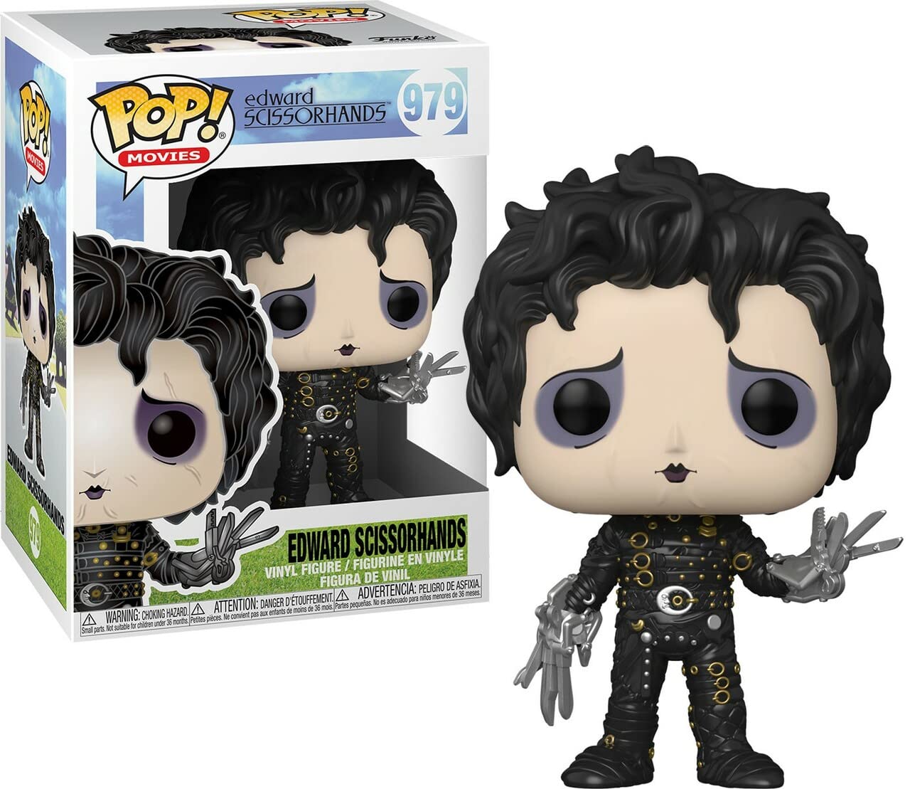 Vinyl collectible figure with curly dark hair, black studded coat, and silver scissor hands