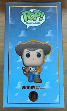 Woody Funko Pop box with Woody illustration, number 400, and red pencil accessory