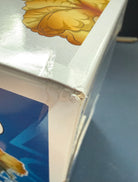 Funko Pop! Games figure box corner with torn white cardboard and clear window