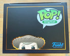 Funko Pop Digital box side with Pop logo and partial Woody head illustration