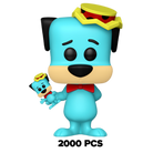 Light blue vinyl dog figure with yellow cap and red bow tie holding a small accessory