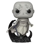 Collectible vinyl figure with gray head, light wrap, black cape, holding sword