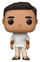 Collectible character figure in white robe with tied belt, tan pants, brown shoes