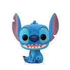 Flocked blue Stitch vinyl figurine sitting, with large ears and toothy grin