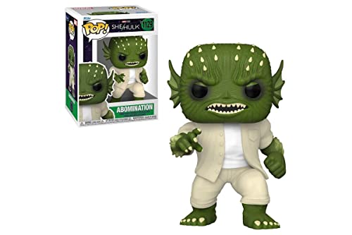Vinyl collectible figure of green spiky monster in white shirt and pants