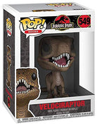 Velociraptor vinyl figure in display box, open jaws and yellow eyes